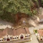 morro deslizando em cima de casarão