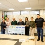 Auricchio e moradores sorteados na Nossa Nota
