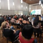 Pessoas em palestra