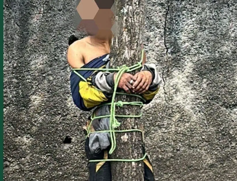 homem amarrado