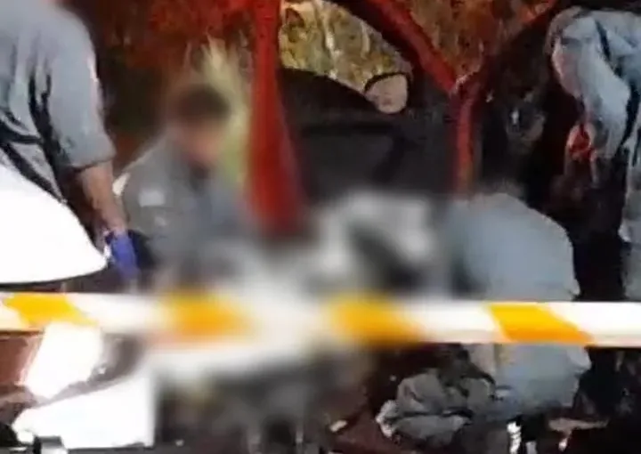 policial militar sendo socorrido