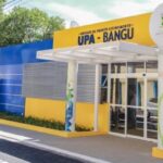 Vítima reconhece suspeito de 40 anos pelas roupas; ele procurou atendimento em UPA Bangu após ser ferido.